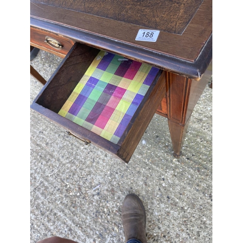 188 - An edwardian mahogany kneehole writing table