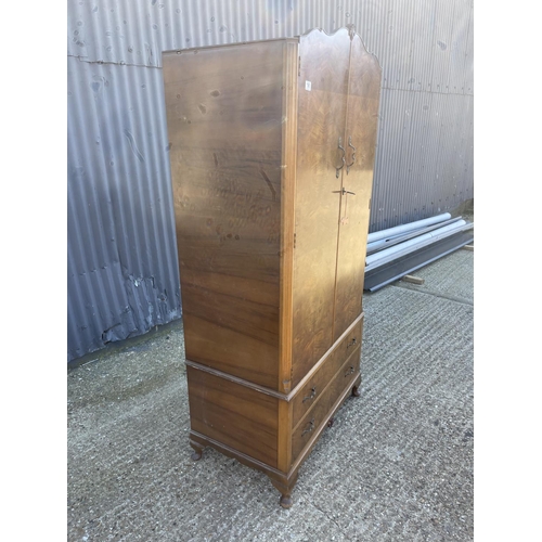 190 - A walnut wardrobe with two drawers