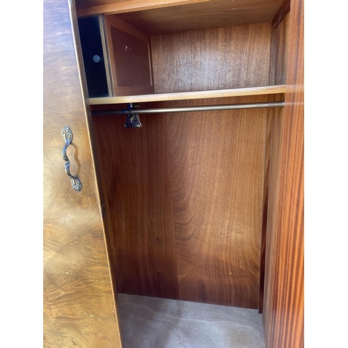 190 - A walnut wardrobe with two drawers