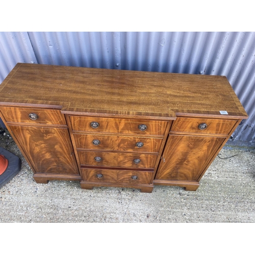 191 - A reproduction mahogany break front sideboard 137x44x90