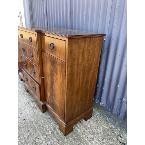 191 - A reproduction mahogany break front sideboard 137x44x90