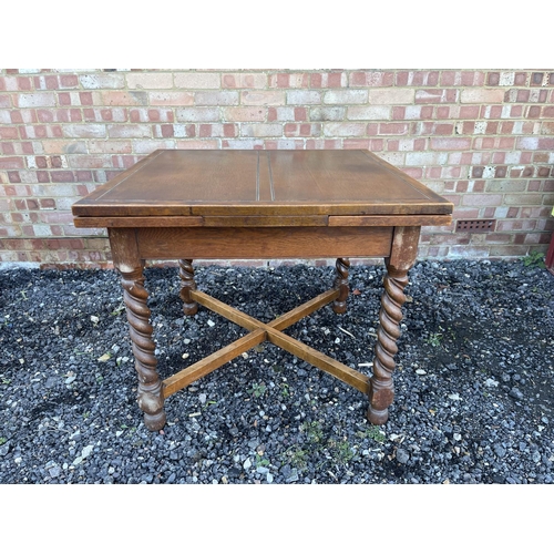 2 - An oak barley twist drawer leaf table 92x92x78