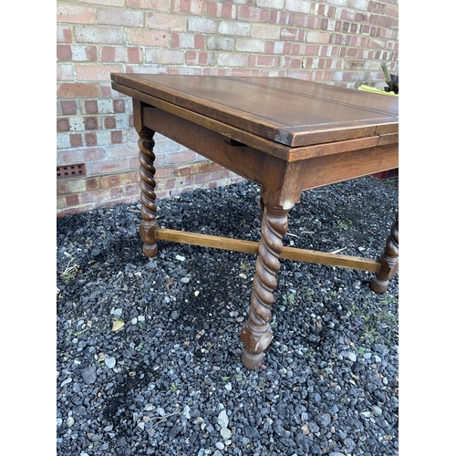 2 - An oak barley twist drawer leaf table 92x92x78