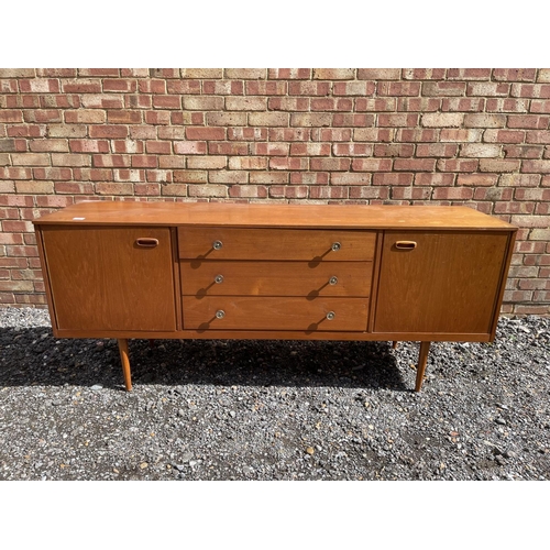 20 - A mid century teak sideboard 183x46 x 77