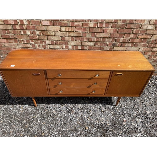 20 - A mid century teak sideboard 183x46 x 77