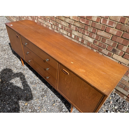 20 - A mid century teak sideboard 183x46 x 77