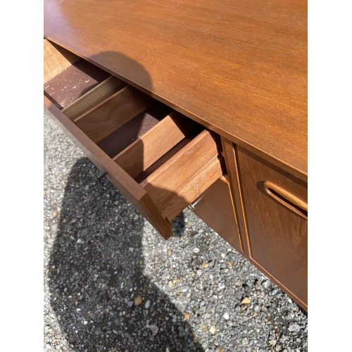 20 - A mid century teak sideboard 183x46 x 77