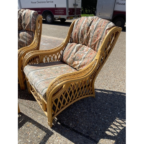 203 - A pair of bamboo conservatoy armchairs with matching occasional table