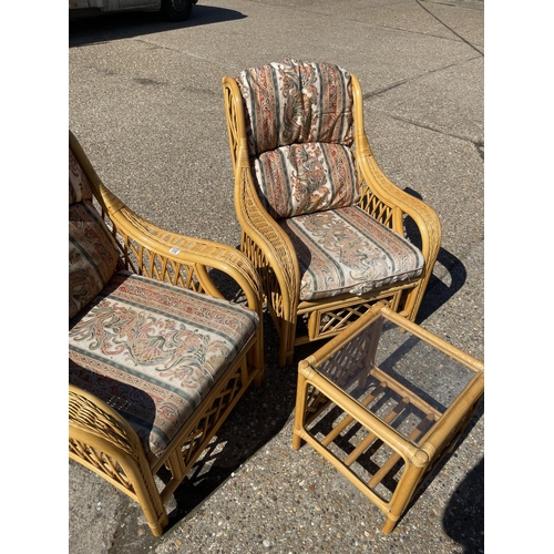 203 - A pair of bamboo conservatoy armchairs with matching occasional table