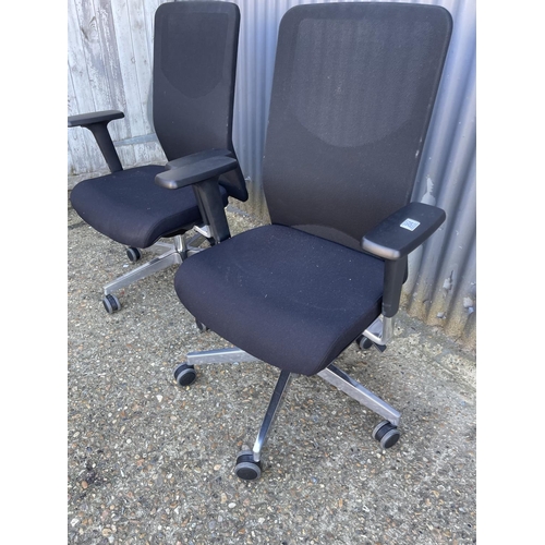 204 - A pair of modern office desk chairs