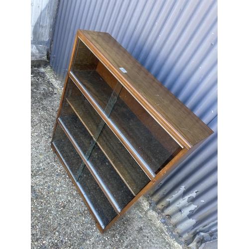 209 - A glazed three section stacking bookcase by MINTY 90x23x113