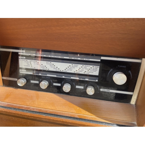 21 - A mid century teak radiogram