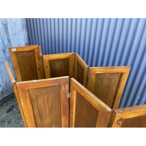 220 - A pair of wooden four section partitioning screens 115 cm tall