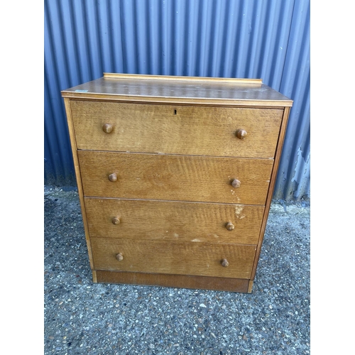 223 - A mid century light oak chest of drawers 77x45x90