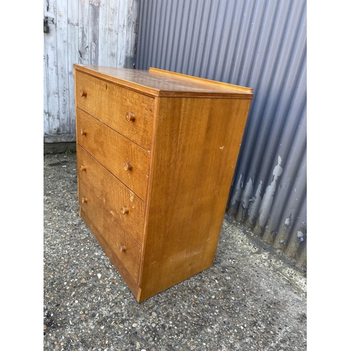 223 - A mid century light oak chest of drawers 77x45x90