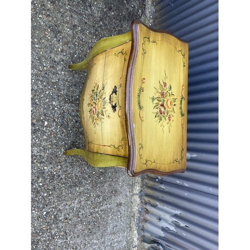 228 - A bombe front chest of two drawers painted with floral pattern 70x40x78