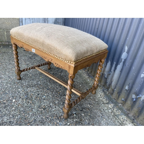 233 - A large barley twist oak framed stool seat with stuffed hessian seat 80x50x75