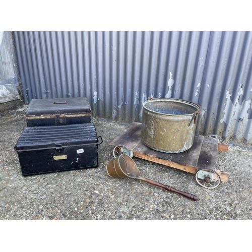 240 - A brass bucket and ladle, trolley, and two vintage boxes