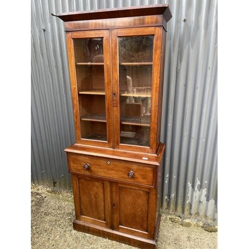 259 - A victorian mahogany bookcase cupboard 85x 40x194