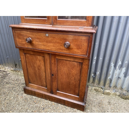 259 - A victorian mahogany bookcase cupboard 85x 40x194