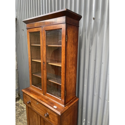 259 - A victorian mahogany bookcase cupboard 85x 40x194