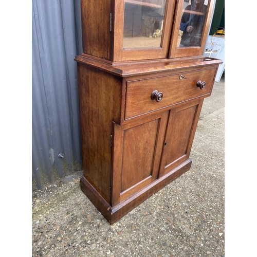 259 - A victorian mahogany bookcase cupboard 85x 40x194