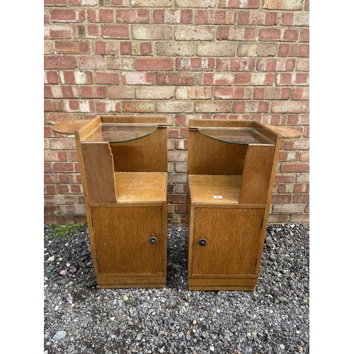 26 - A pair of early 20th century oak pot cupboard bedsides