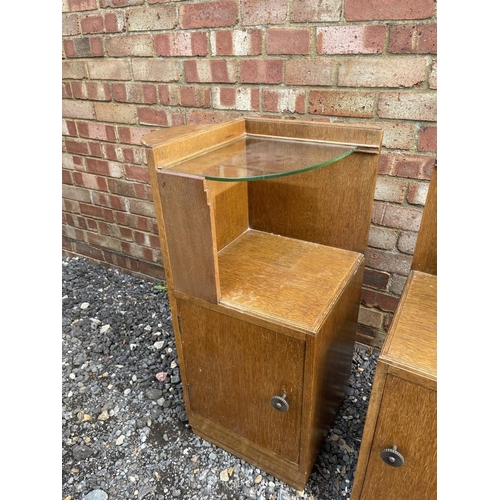 26 - A pair of early 20th century oak pot cupboard bedsides