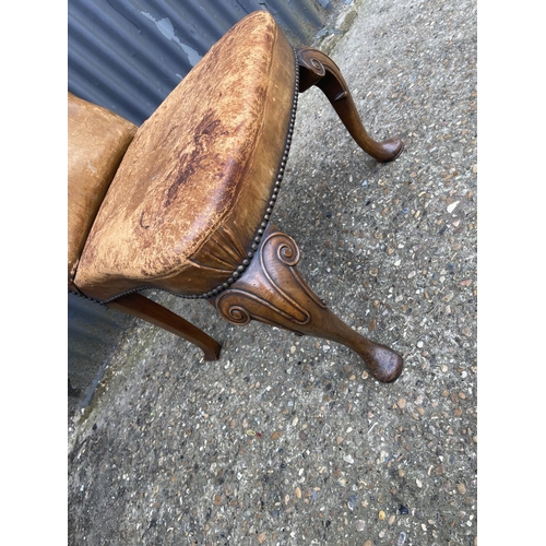 260 - A Queen Anne style tan leather chair