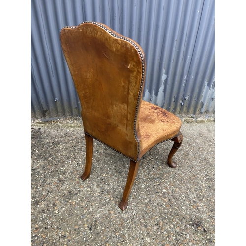 260 - A Queen Anne style tan leather chair