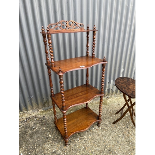 263 - A victorian mahogany four tier whatnot together with an inlaid table