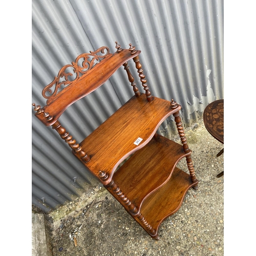 263 - A victorian mahogany four tier whatnot together with an inlaid table