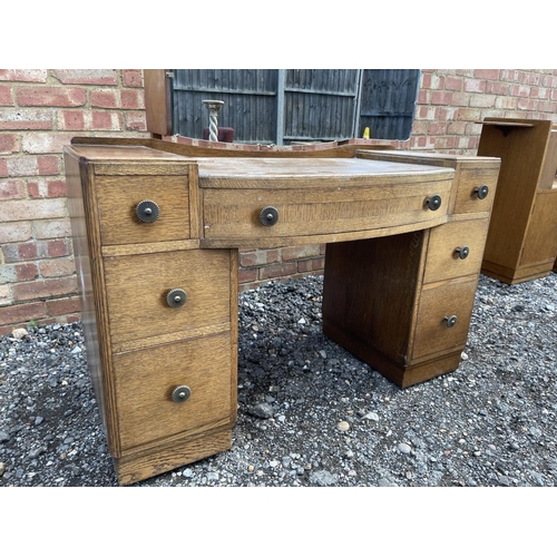 27 - An early 20th century oak dressing table