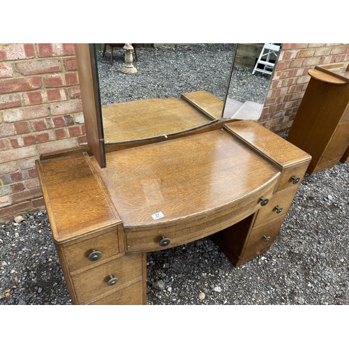 27 - An early 20th century oak dressing table