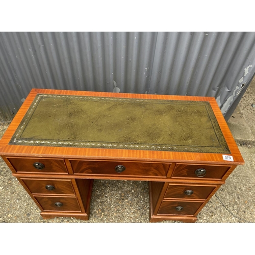 279 - A dynatron record deck with speakers all concealed within a yew writing desk cabinet with green leat... 