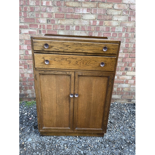 28 - An oak gentleman's tallboy cupboard 82x48x 118