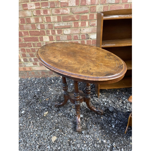 33 - A Victorian table, bookcase, whatnot and magazine rack