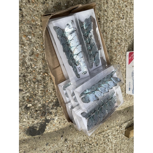 339 - 10 packs of silver butterflys