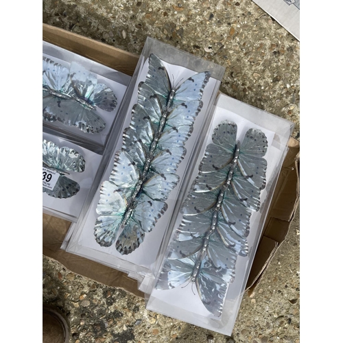 339 - 10 packs of silver butterflys