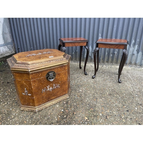 350g - An ornate log box / trunk together with a pair of reproduction mahogany side tables