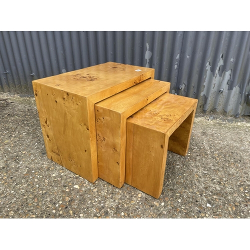 355 - A birds eye maple deco style nest of three tables
