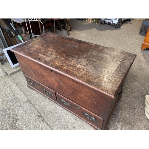 379 - A mahogany two drawer mule chest 127x64x68