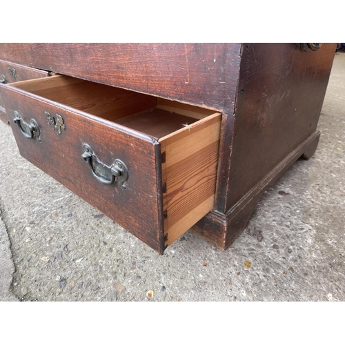 379 - A mahogany two drawer mule chest 127x64x68