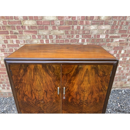 48 - A deco style walnut tallboy cupboard