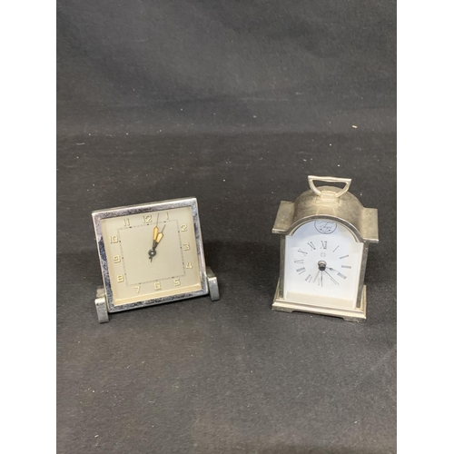 499 - Pair of vintage travel clocks