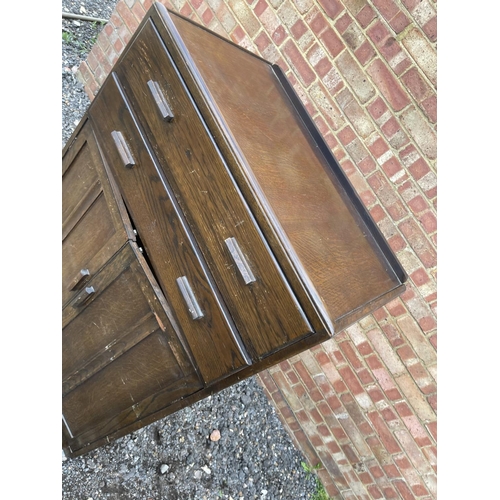 50 - A mid century utility style oak tallboy / school cupboard