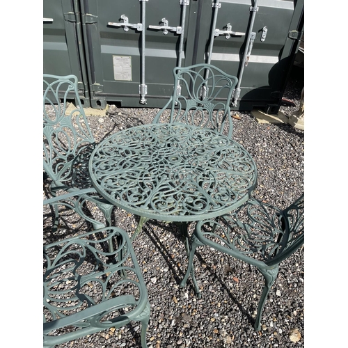 52 - A green painted aluminium garden table together with two chairs and two carver chairs 80cm