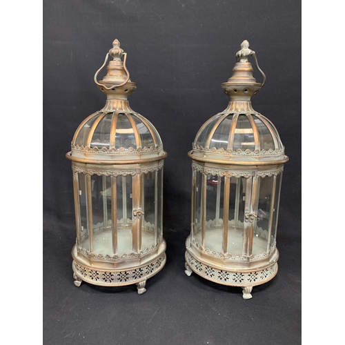 551 - Pair Antique copper effect lanterns, height 60cms