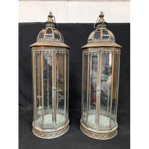 552 - Pair Antique tall copper effect lanterns, height 86cms