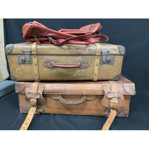 563 - Heavy leather case, bound fibre case and red leather holdall